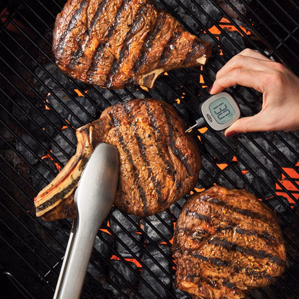 How do you cook a ribeye steak on a grill?