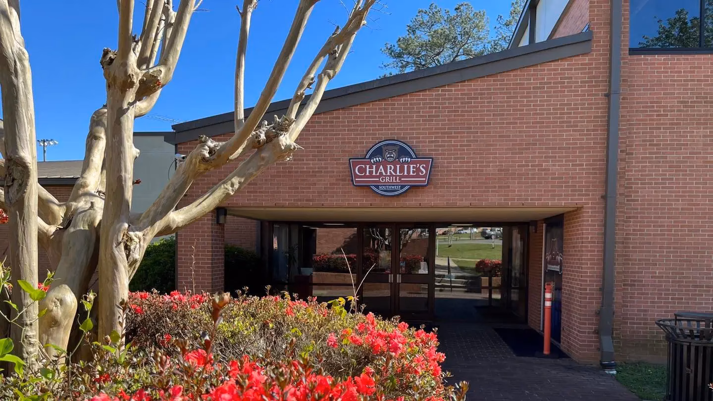 What are the hours of operation at Charlie's bar?