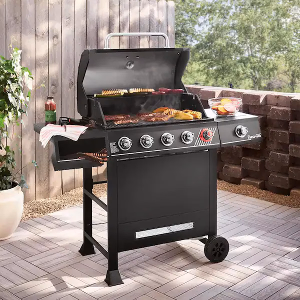 How do you preheat a gas grill?