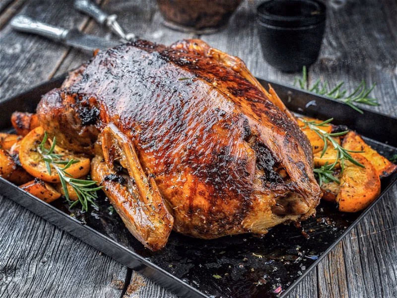 How do you cook duck on a rotisserie?