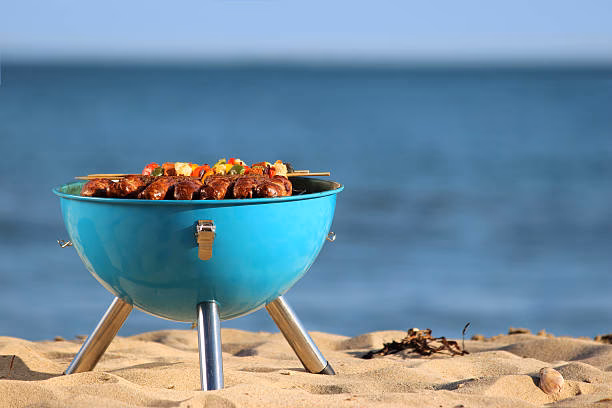 Wie schütze ich meine Kinder beim Grillen am Strand?
