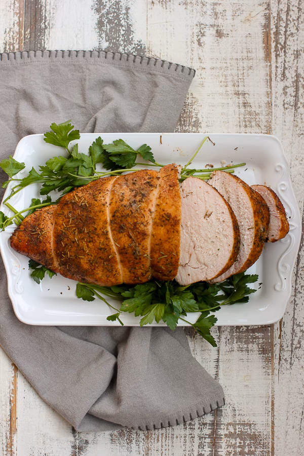 What temperature should a turkey breast be preheated before grilling?