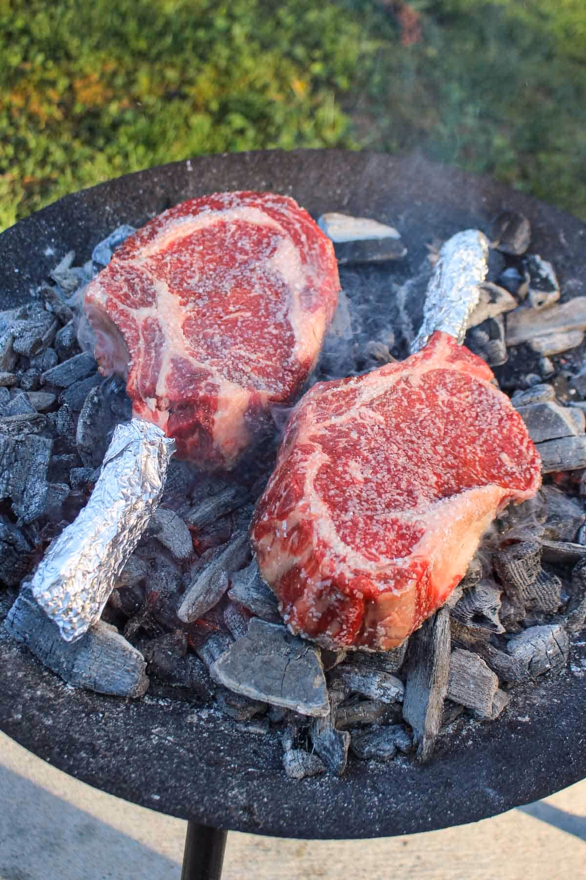 How do you cook a steak on a charcoal stove?