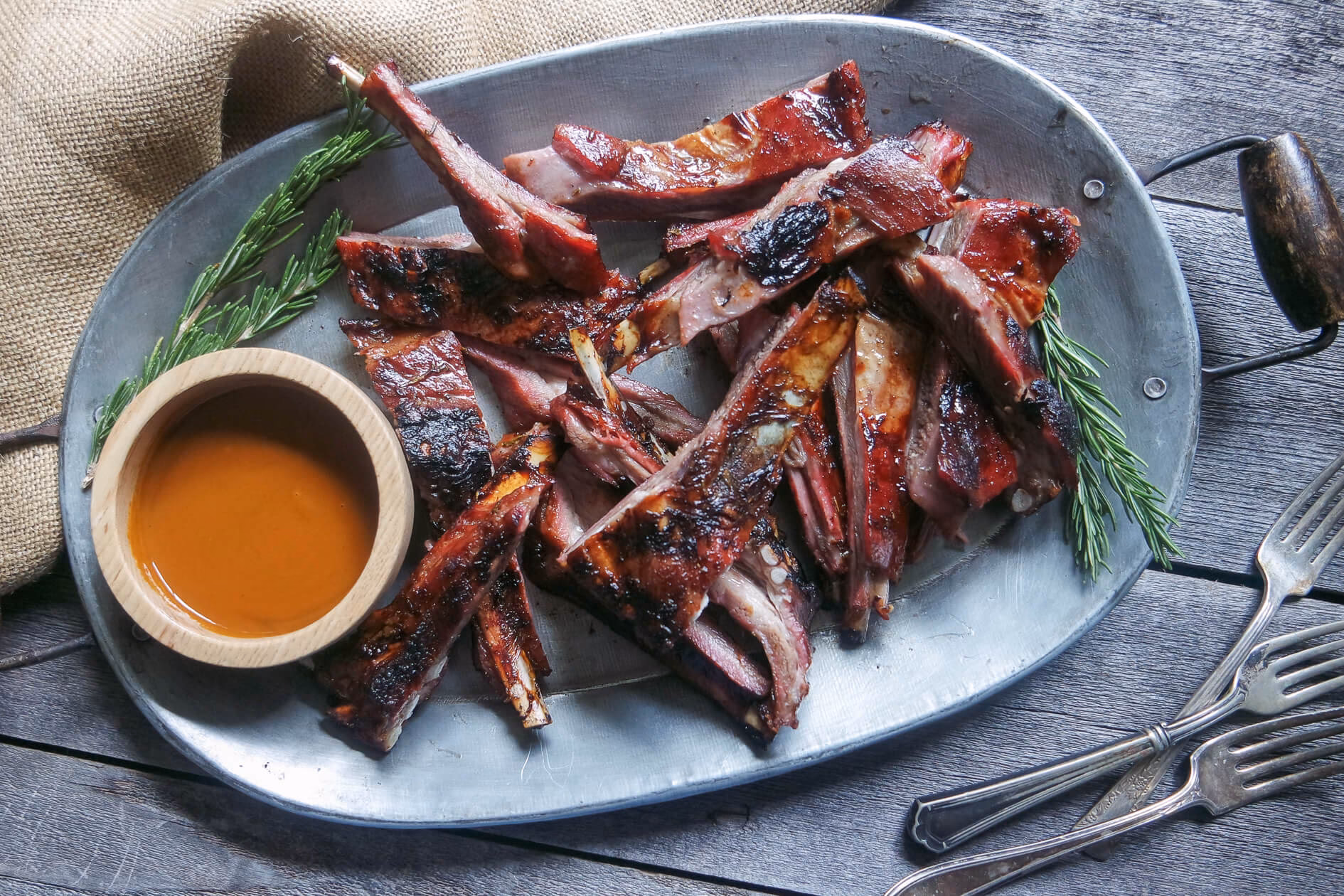 What temperature should lamb ribs be grilled?
