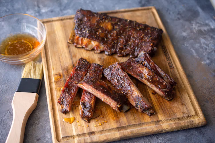 What temperature should lamb ribs be grilled?
