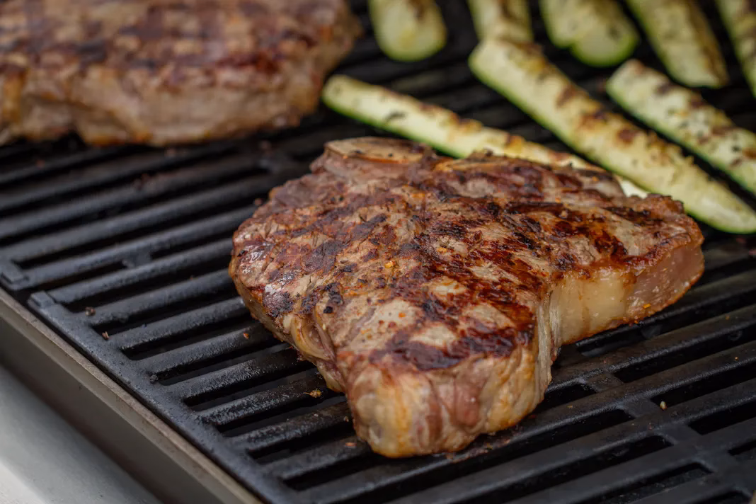 How do you cook a steak on a gas grill?