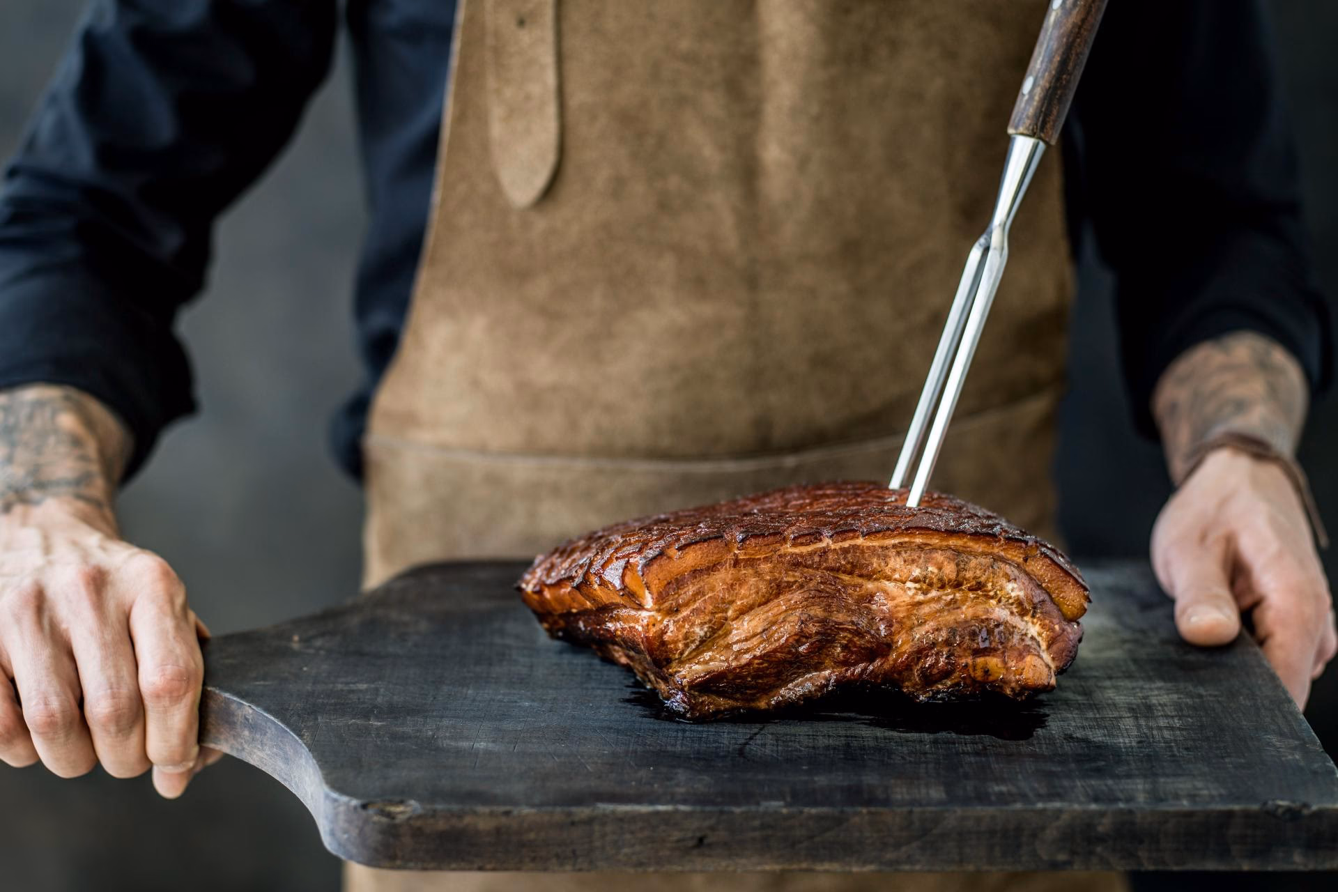 Wie bereite ich einen Schweinsbraten zu?